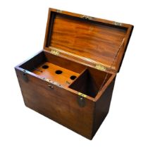 A VICTORIAN MAHOGANY AND BRASS CAMPAIGN WINE COOLER The rise and fall top enclosing a six bottle