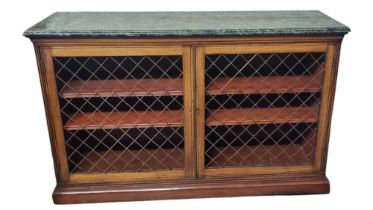 A 19TH CENTURY MAHOGANY FLOOR STANDING SIDE BY SIDE DOUBLE BOOKCASE Having a green faux marble top