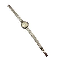 ROLEX, PRECISION, A VINTAGE 9CT WHITE GOLD LADIES’ WRISTWATCH Silver tone dial with Arabic quarter