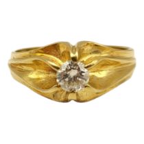 A VINTAGE 18CT GOLD AND DIAMOND GENTS SOLITAIRE RING The silver round cut diamond in a claw setting.