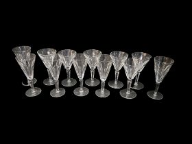 A SET OF SIX WATERFORD LEAD CRYSTAL CUT WINE GLASSES With a drawn trumpet bowl, cut panel body, on a