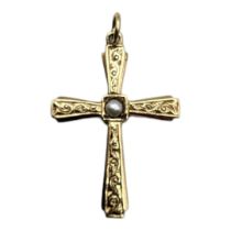 A VINTAGE 9CT GOLD AND PEARL CRUCIFIX The single pearl to center and engraved decoration. (approx