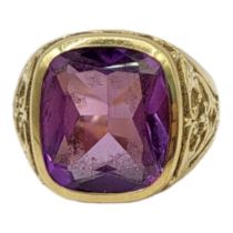 A VINTAGE 14CT GOLD AND AMETHYST GENT’S SIGNET RING The rectangular facet stone in a scrolled mount.