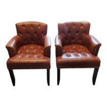 A PAIR OF VICTORIAN STYLE TUB ARMCHAIRS In faux button back tan leather upholstery, on square