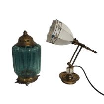 A VICTORIAN STYLE ADJUSTABLE ANGLE POISE DESK LAMP With milk glass shade and weighted bottom, along