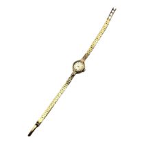 CERTINA, A VINTAGE 9CT GOLD LADIES’ WRISTWATCH Small circular dial with gilt number markings, on