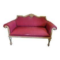 A 19TH CENTURY CHIPPENDALE DESIGN PARCEL GILT AND PAINTED TWO SEAT SETTEE The serpentine top rail