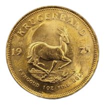 A 22CT GOLD FULL 1OZ KRUGERRAND COIN, DATED 1975 With portrait bust and springbok design to reverse,