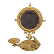 AN EARLY 20TH CENTURY PERSIAN GILT METAL AND GLASS VANITY MIRROR Swivel mirror with engraved