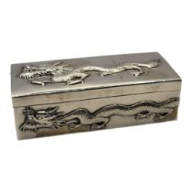 WANG HING, AN EARLY 20TH CENTURY CHINESE SILVER 'DRAGON' BOX Rectangular form, with embossed