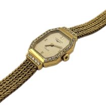 LONGINES, A VINTAGE 18CT GOLD AND DIAMOND LADIES’ WRISTWATCH The octagonal gold tone dial with