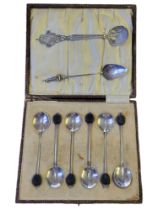 WITHDRAWN A SET OF SIX EARLY 20TH CENTURY SILVER COFFEE SPOONS Having black resin beans to finial