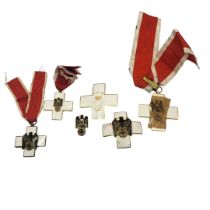 A WWII GERMAN RED CROSS BREAST BADGE,MEDAL AND BADGE Black enamel eagle and swastika on white enamel