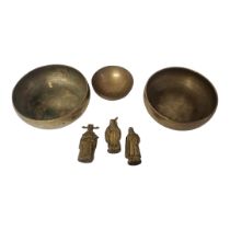 A PAIR OF LATE 19TH/EARLY 20TH CENTURY BRONZE BUDDHIST SINGING BOWLS Circular form, plain design,