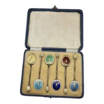 A SET OF SIX EARLY 20TH CENTURY SILVER AND ENAMEL COFFEE SPOONS Harlequin set with pottery bean