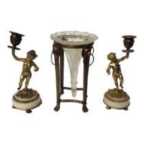 HALCYON DAYS, A PAIR OF MID CENTURY GILT BRONZE CANDLESTICKS In the form of putti standing on