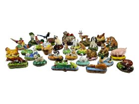 LIMOGES, FRANCE, A COLLECTION OF THIRTY ‘PEINT MAIN’ ANIMAL THEMED TRINKET BOXES Comprising two