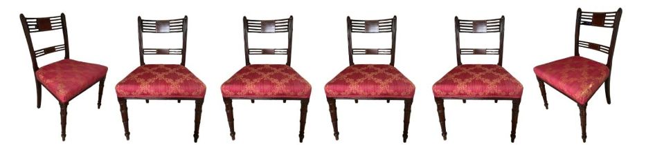 A SET OF SIX 19TH CENTURY REGENCY MAHOGANY AND INLAID BAR BACK DINING CHAIRS With upholstered seats,