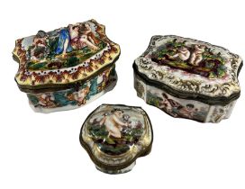 THREE LATE 19TH CENTURY ITALIAN CAPODIMONTE HINGED BOXES Decorated with putti, figures and busts
