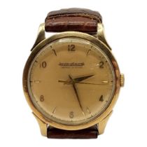 JAEGER LECOULTRE, A MID CENTURY 9CT GOLD CASED GENTLEMEN’S WRISTWATCH Having Arabic numeral and