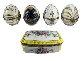 LIMOGES, FRENCH, A COLLECTION OF FOUR LARGE EGG SHAPED PORCELAIN BOXES, TOGETHER WITH LARGE