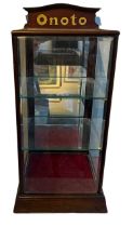 A 19TH CENTURY MAHOGANY AND CRYSTAL GLASS SHOP DISPLAY CABINET With single mirrored door opening