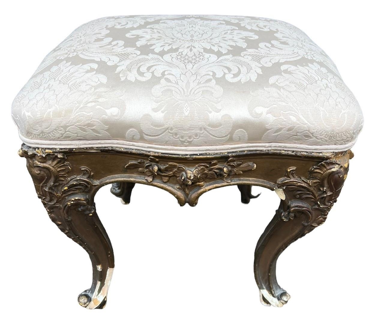 GILLOWS, A 19TH CENTURY CARVED WALNUT CIRCULAR FOOTSTOOL The upholstered top, raised on four - Image 2 of 8