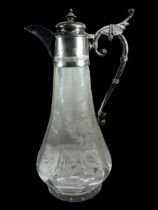 AN EARLY 20TH CENTURY SILVER PLATED AND GLASS COMMEMORATIVE CLARET JUG Having etched portraits of