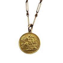 A VICTORIAN 22CT GOLD HALF SOVEREIGN PENDANT, DATED 1914 Attached to a 9ct gold stylised link chain.