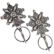 MARRAKESH, MORROCO, A PAIR OF EARLY 20TH CENTURY SILVER FIBULAE (TISERNAS) Having chased, punched