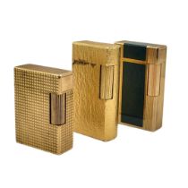 ST. DUPONT, PARIS, TWO LIGNE 1 AND LIGNE 2 GOLD PLATED LIGHTERS Together with gold plated Dunhill
