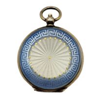 A VINTAGE SILVER AND ENAMEL MIRRORED COMPACT FORMED AS A POCKET WATCH Double sided engine turned