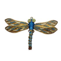 A 20TH CENTURY SOUTH-EAST ASIA GILT, JADE AND ENAMEL DRAGONFLY BROOCH Having pierced filigree wings,