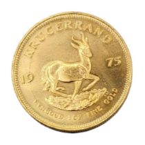 SOUTH AFRICAN 1975 ONE OUNCE GOLD KRUGERRAND Bust of Paul Kruger facing left, springbok walking