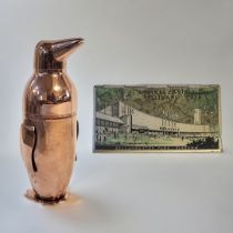 A LATE 20TH CENTURY COPPER COVERED NOVELTY COCKTAIL SHAKER IN DECO MANNER FORMED AS A PENGUIN With