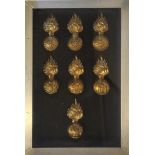 A COLLECTION OF SEVEN BRASS FUSILIER HEADDRESS BADGES To include Inniskillin and Lancashire