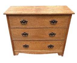 AN ARTS & CRAFTS PERIOD OAK CHEST OF THREE LONG DRAWERS. 96.5cm x 50cm x 75.5 Condition: good