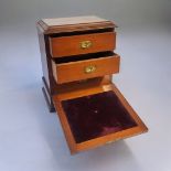 A LATE VICTORIAN MAHOGANY TOP DESK STATIONARY BOX Opening to reveal a writing surface top