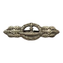 A GERMAN WWII WHITE METAL U-BOAT COMBAT CLASP ‘Maker Peekhaus Entwurt Aus F Schwerin, Berlin 68’.