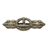 A GERMAN WWII WHITE METAL U-BOAT COMBAT CLASP ‘Maker Peekhaus Entwurt Aus F Schwerin, Berlin 68’.