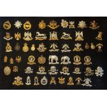 A COLLECTION OF FIFTY EARLY 20TH CENTURY AND LATER BRITISH ARMY CAP BADGES To include 19th Alexander
