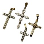A COLLECTION OF VINTAGE 9CT GOLD AND PASTE CRUCIFIX PENDANTS. (largest pendant approx 4cm)