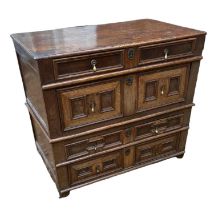 A JAMES II PERIOD OAK CHEST OF DRAWERS Fitted with brass teardrop handles. (63cm x 105cm x 92cm)