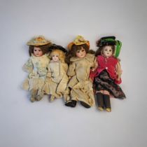 ARMAND MARSEILLE, A SET OF THREE BISQUE HEADED CHARACTER BEBE DOLLS, CIRCA 1900 Five piece