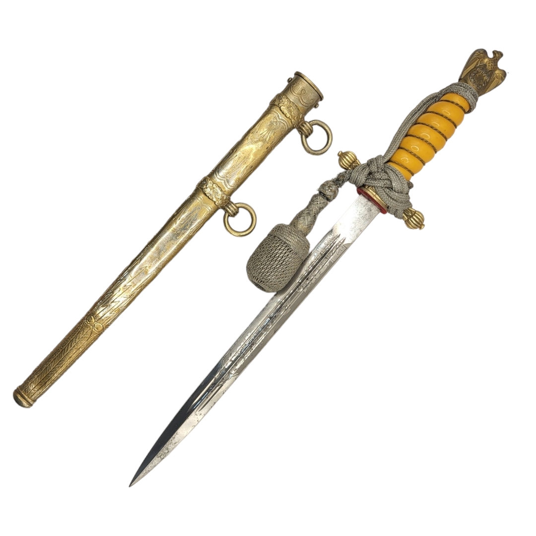 A GERMAN WWII NAVAL OFFICER’S DAGGER AND DECORATED SCABBARD With yellow grip, silver braid knot, - Image 3 of 4