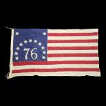 A 20TH CENTURY AMERICAN DECLARATION OF INDEPENDENCE COMMEMORATIVE FLAG Marked 76 with thirteen stars