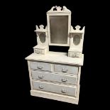 A PAINTED PINE DRESSING CHEST With three bevelled mirrors above two trinket drawers (above two