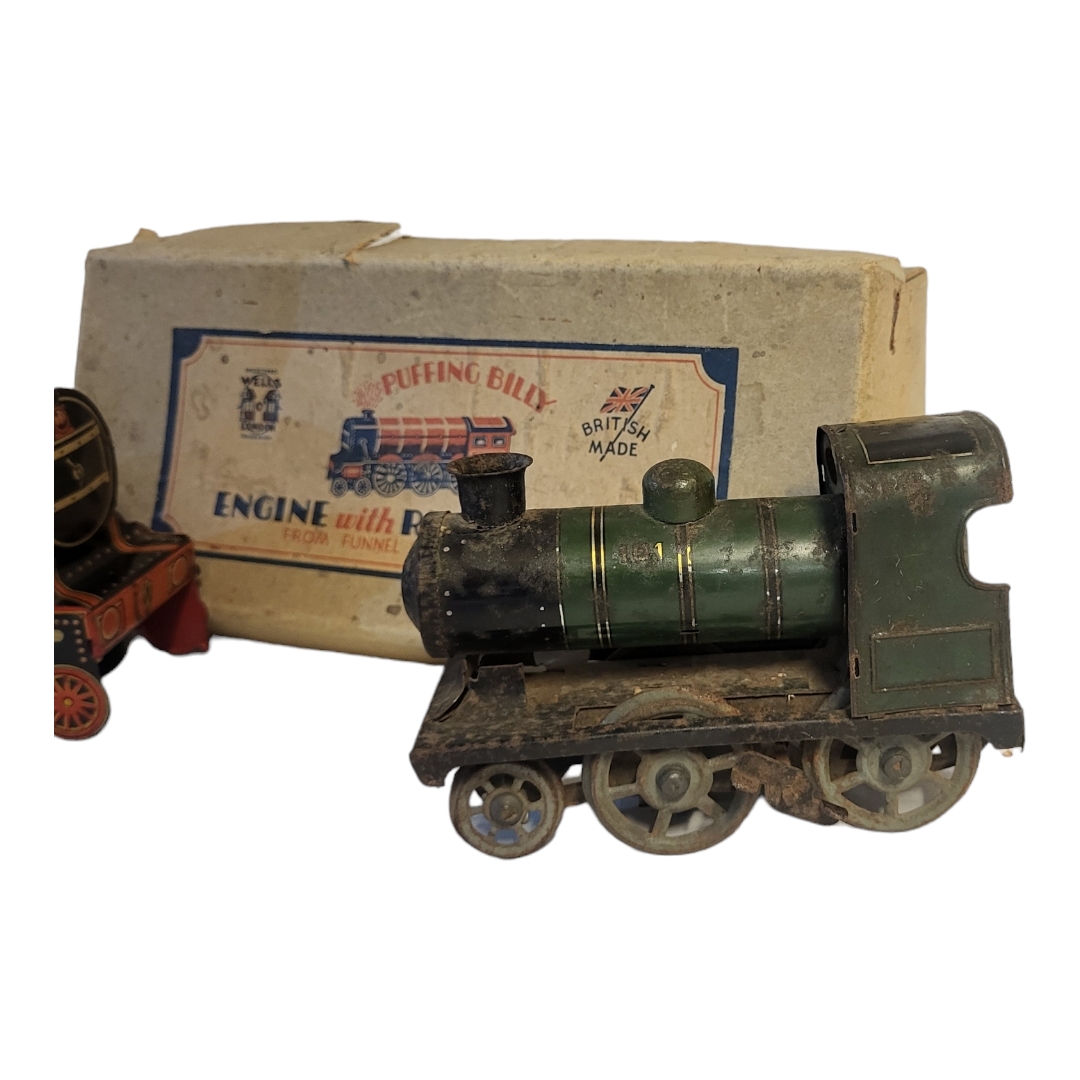 A 1930’S BOXED PUFFING BILLY TINPLATE PAINTED CLOCKWORK MODEL OF LOCOMOTIVE BY WELLS OF LONDON - Image 4 of 4