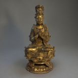 A GILT BRONZE FIGURE OF TARA In the manner of Qing Dynasty, wearing a jewelled dhoti beaded necklace