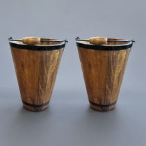 A PAIR OF WOODEN HOOPED CHAMPAGNE BUCKETS With ‘Bollinger’ labelling and bail handles. (30cm x